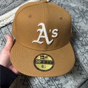 Brand new with tags new era size 6 7/8 wheat colored As fitted